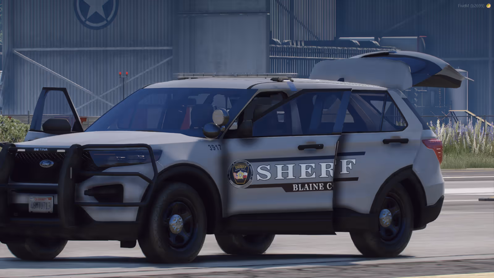Blaine County Sheriff Ford Explorer with doors and trunk open, in-engine still