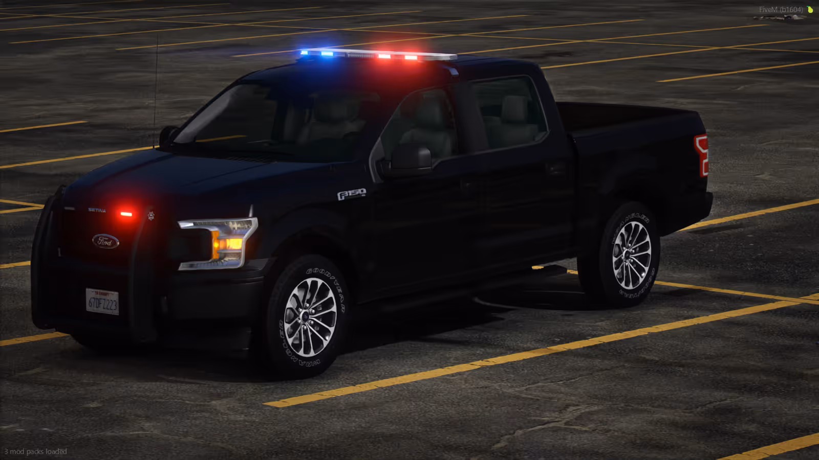 Sheriff F-150 at idle, blue and red lightbar lit, empty lot at dusk